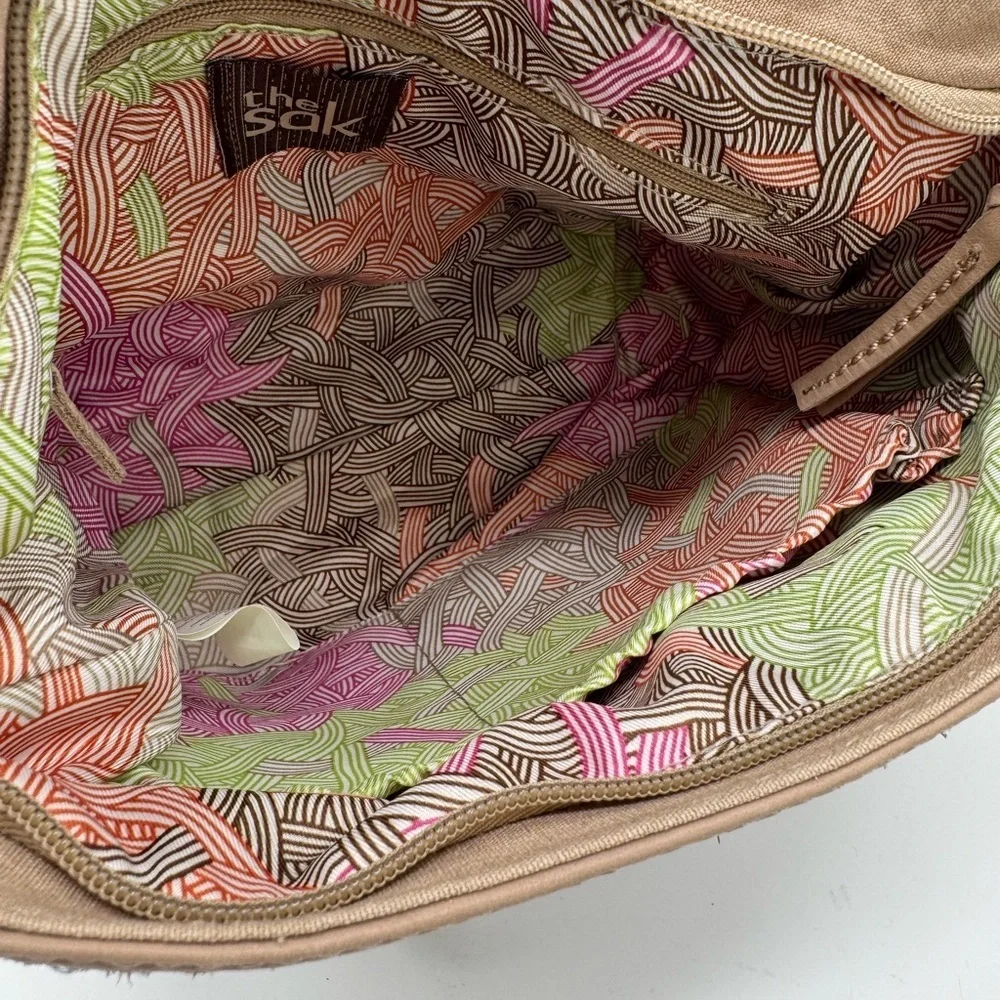 The Sak Tan Indio Leather Shoulder Bag with silver metallic panel